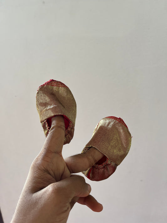 Golden baby booties