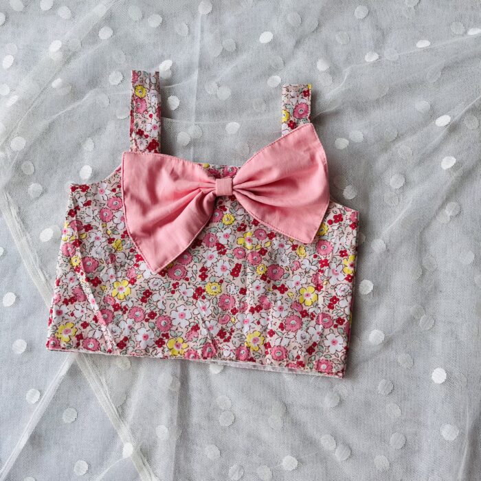 Pink collection floral top with a bow